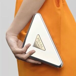 Prada Triangular Silver and Gold Clutch